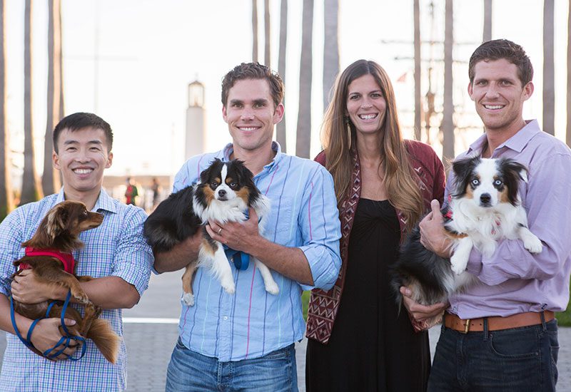 nomnomnow review four founders of nomnomnow three of them holding a dog