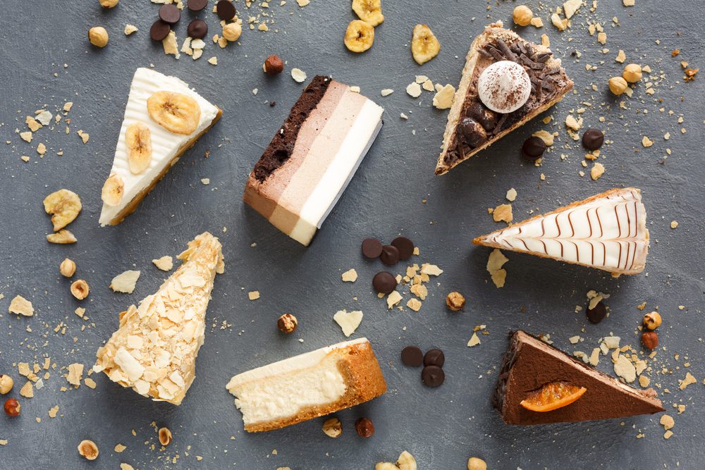 thanksgiving variety of pieces of cake on a messy table